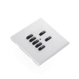 Smart home wall control panel for lighting and blinds. Home automation switch panel with programmable buttons. Smart room control interface with numbered and arrow buttons.